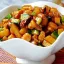 Жареная свинина (кусочками) с орехами в остром кисло-сладком соусе.450г